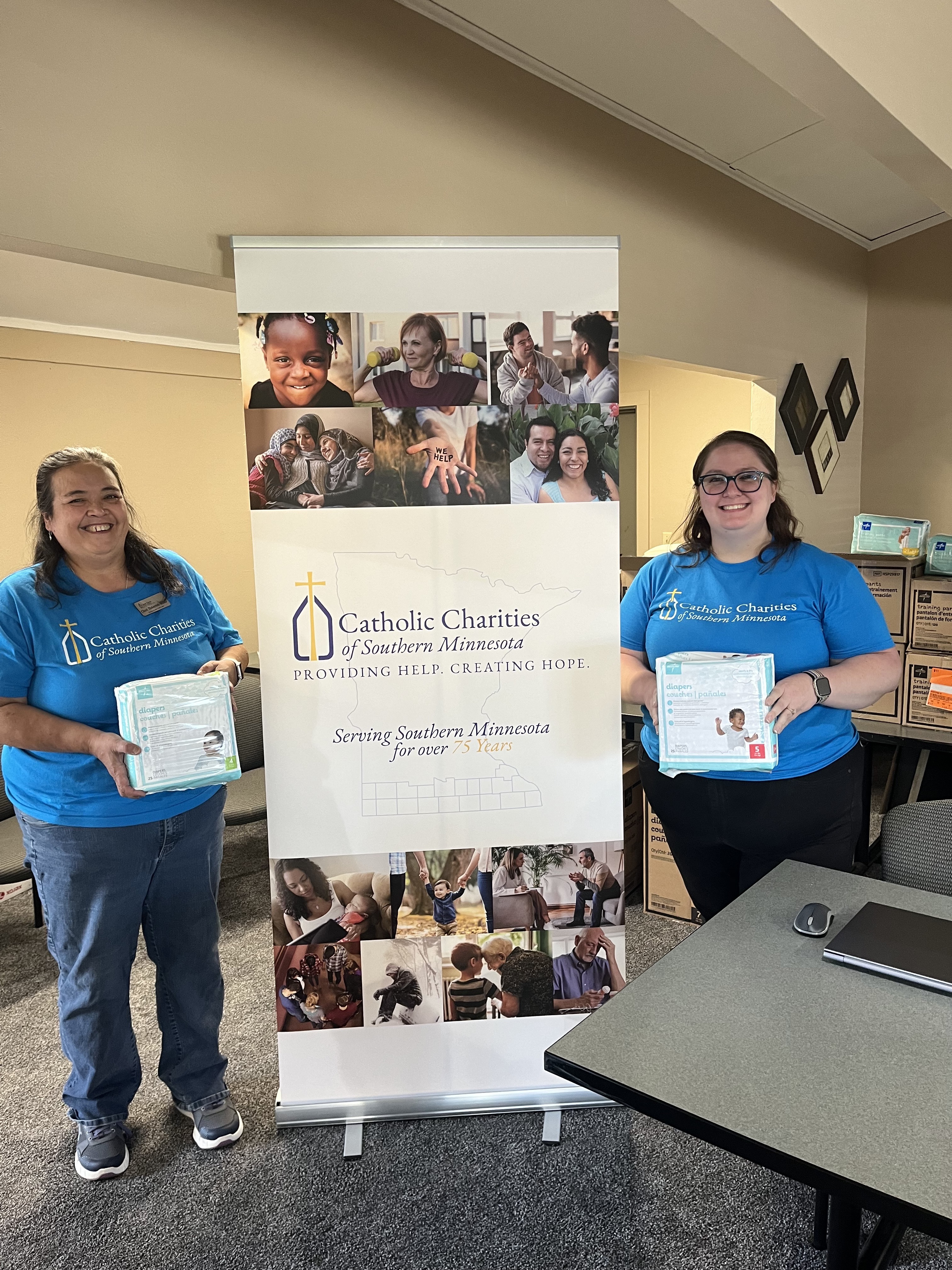 Catholic Charities, diaper distribution, exchange club center for family unity