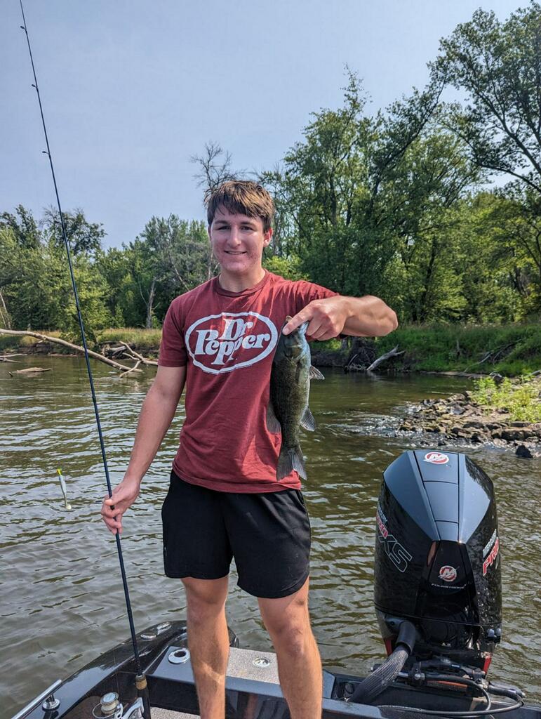 Jaxon Harberts, fishing, hayfield